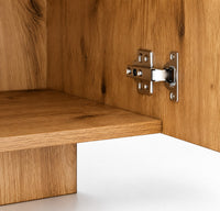 Charnière métallique robuste sur porte de meuble TV Loftora en bois finition chêne artisanal